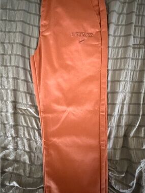 Undefeated Rust Orange Satin Track Pants with Printed Liner